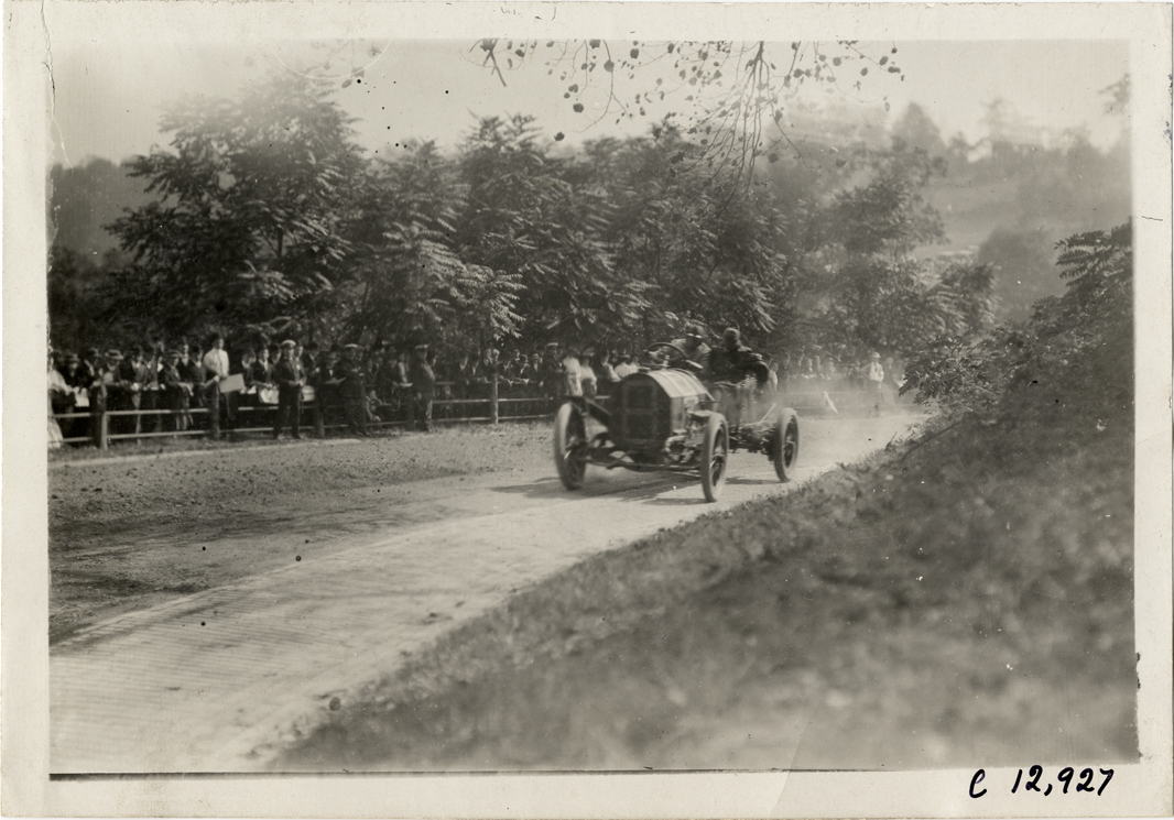 Driver and passenger in racecar, 1909 Fairmount Park races