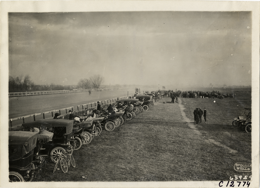 Spectators watching race from automobiles, 1910 Empire City races
