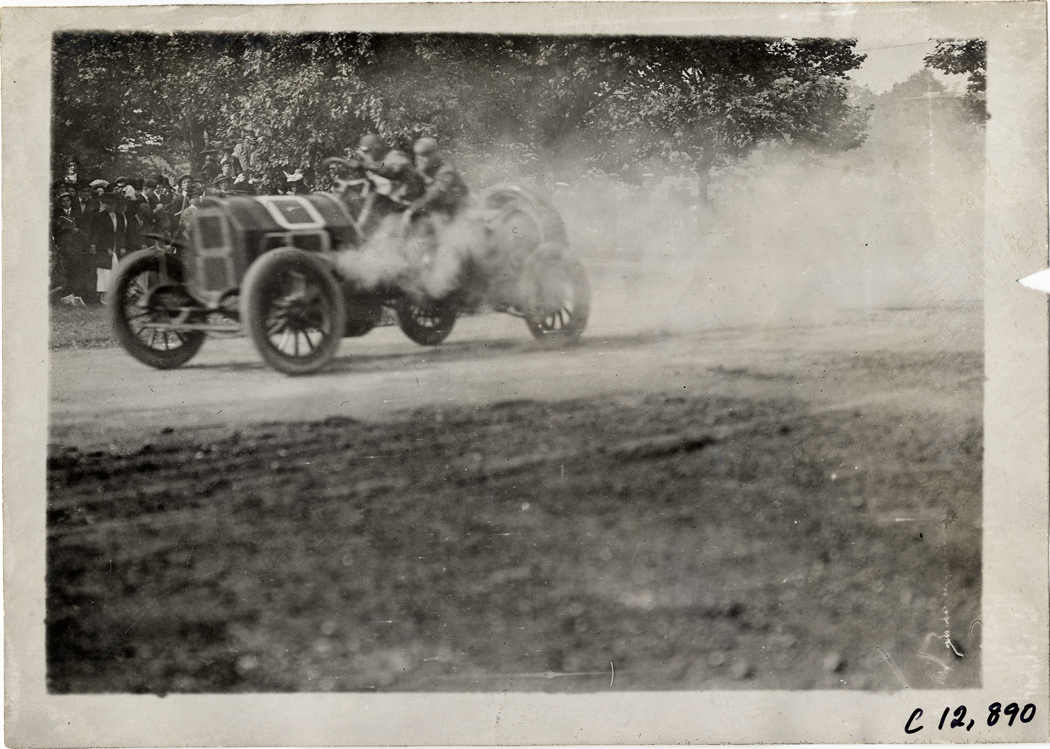 Driver and passenger in racecar, 1909 Fairmount Park races