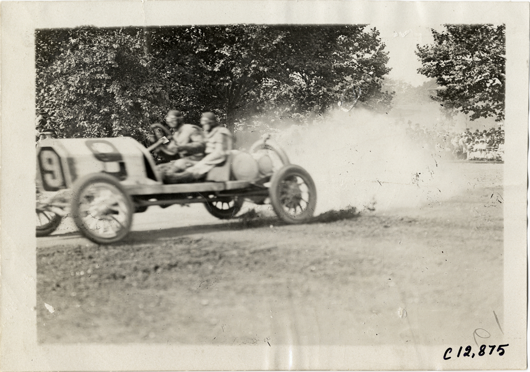 Driver and passenger in racecar, 1909 Fairmount Park races