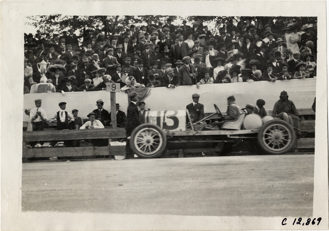 Racecar parked in front of pits, 1909 Fairmount Park races