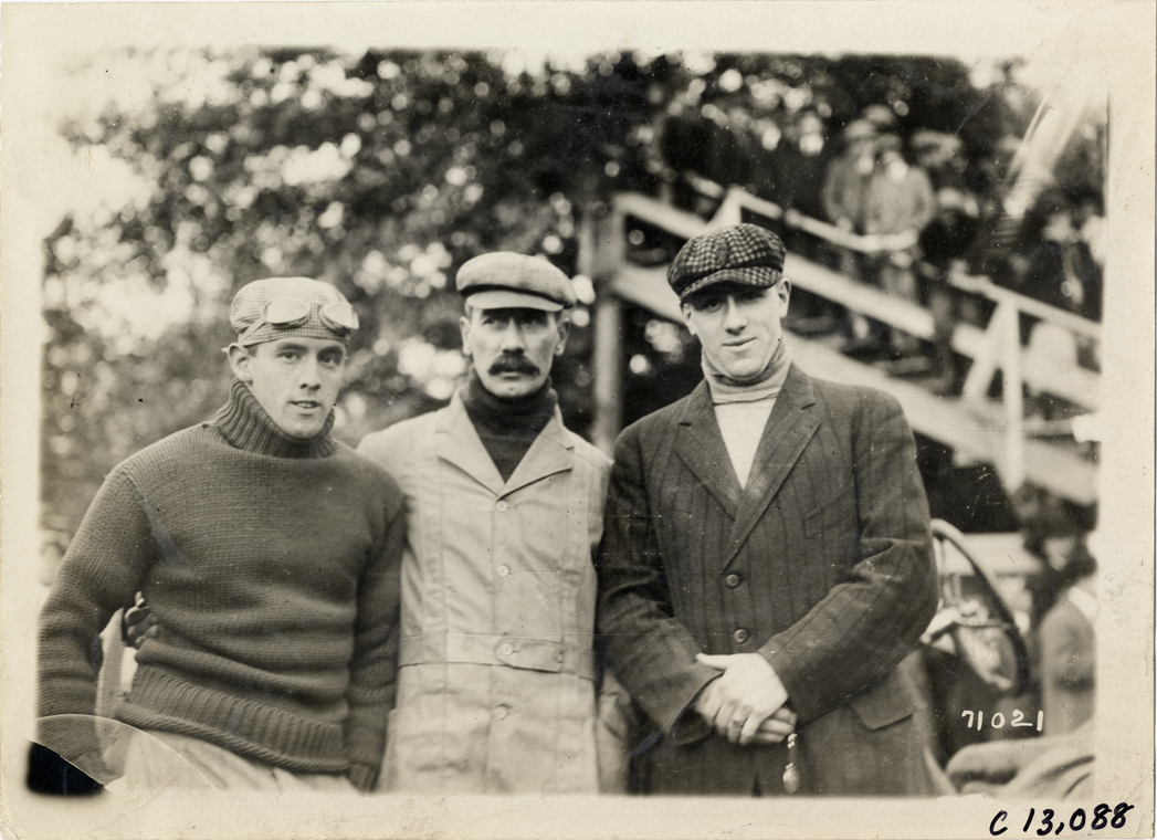 Racecar driver and two men, 1911 Fairmount Park races