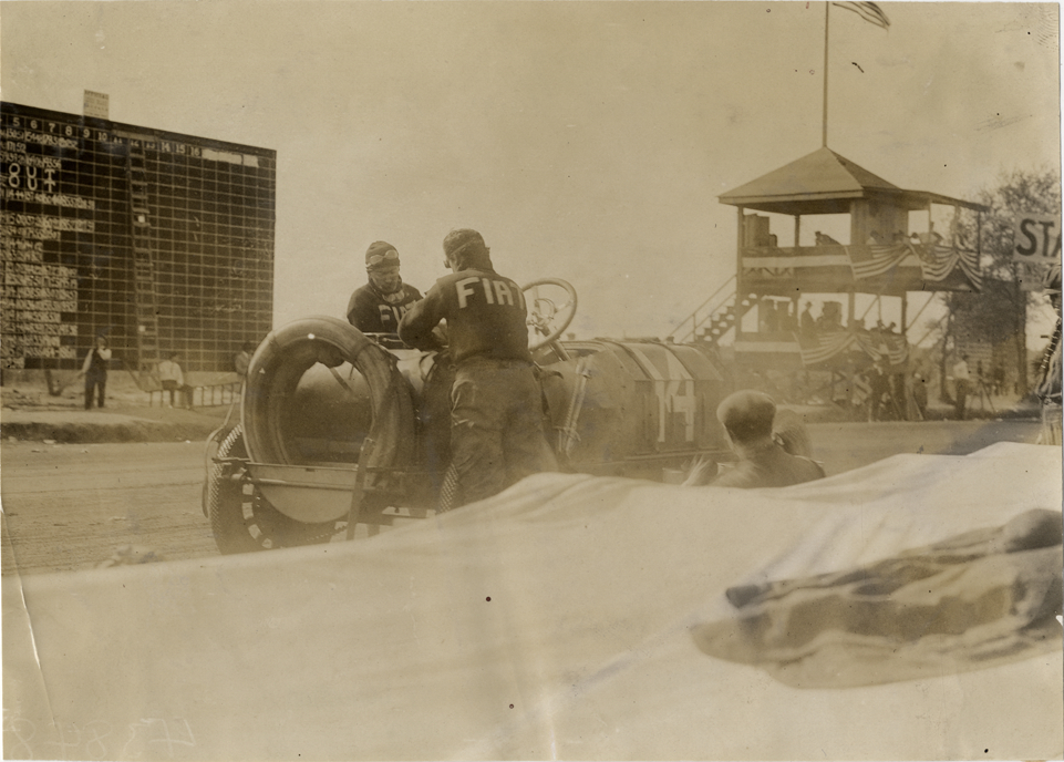 Men working on Fiat racecar, 1908 Grand Prize races