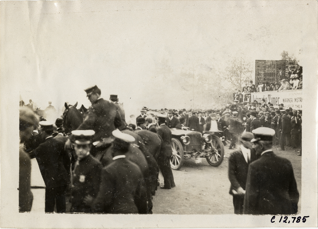 Driver in racecar, 1909 Fairmount Park races
