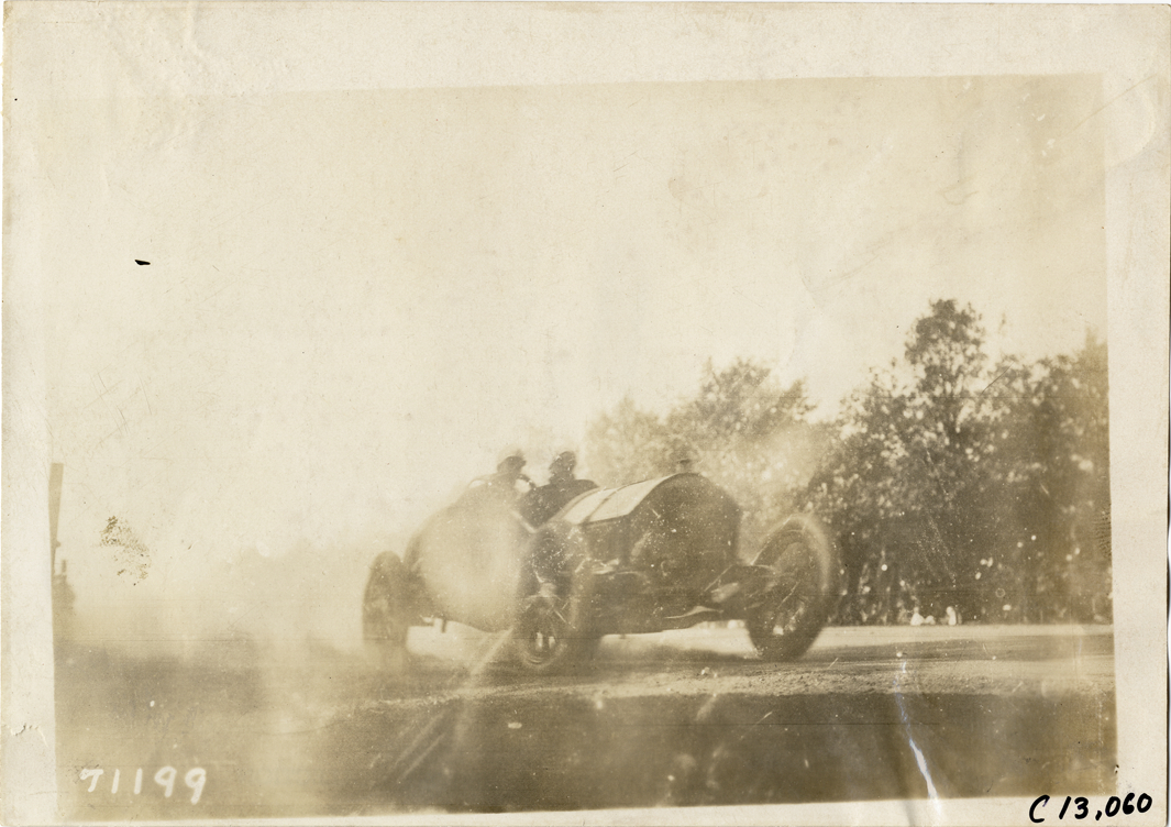 Driver and passenger in racecar, 1911 Fairmount Park races