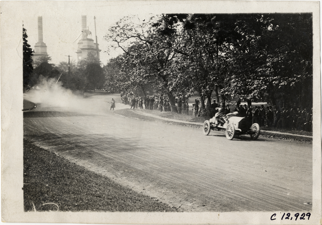 Driver and passenger in racecar, 1909 Fairmount Park races