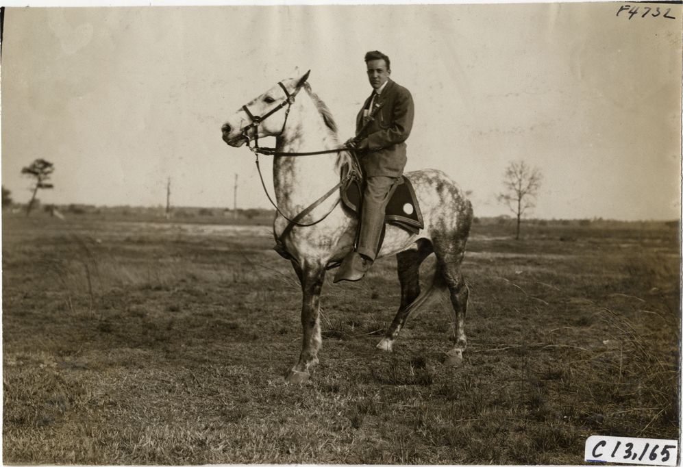 Harry Grant on horseback, 1908 Grand Prize races