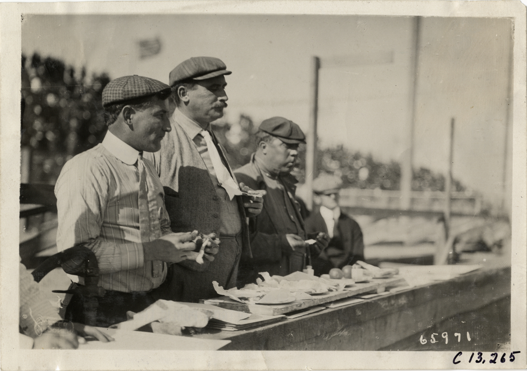 Pit crew eating lunch, 1910 Grand Prize races