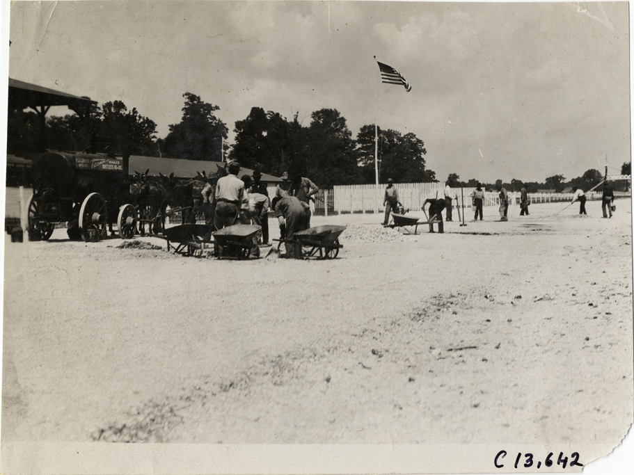 Men repairing track surface, 1909 Indianapolis races