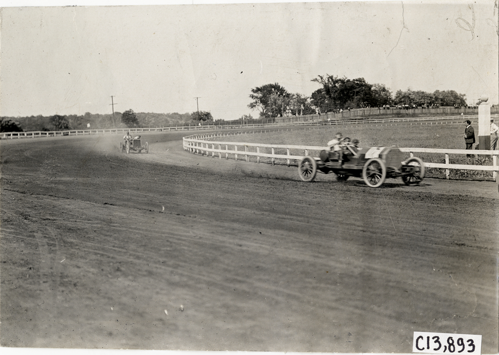 Cars racing on track, 1908 Long Branch races