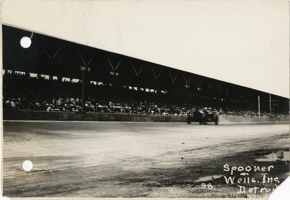 Jules Goux and passenger in Peugeot racecar, 1913 Indianapolis 500 automobile race