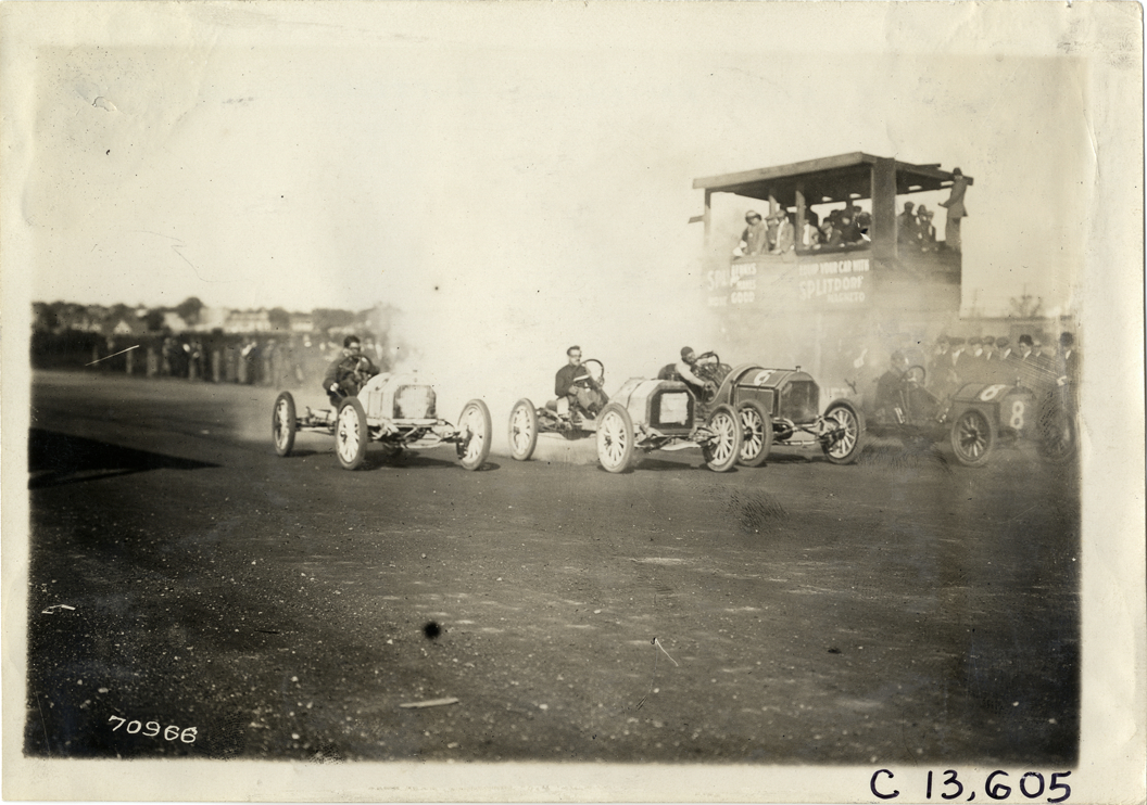 Racecars at starting line, 1911 Guttenberg races