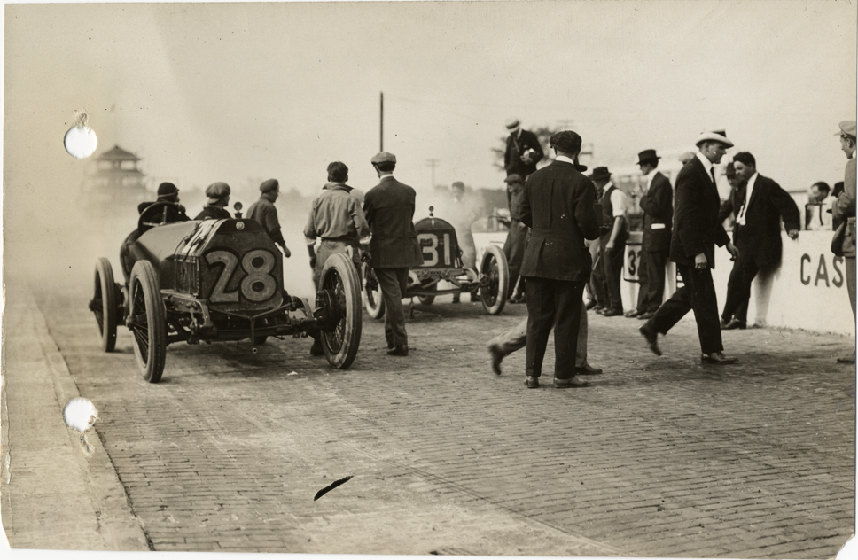 Racecars at pits, 1913 Indianapolis 500 automobile race