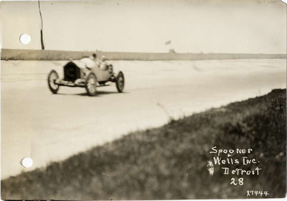 Gil Anderson and passenger in Stutz racecar, 1913 Indianapolis 500 automobile race
