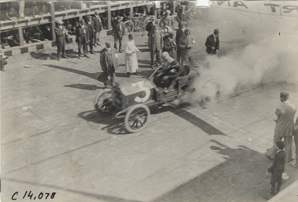 Driver and passenger in racecar, 1908 Lowell road race