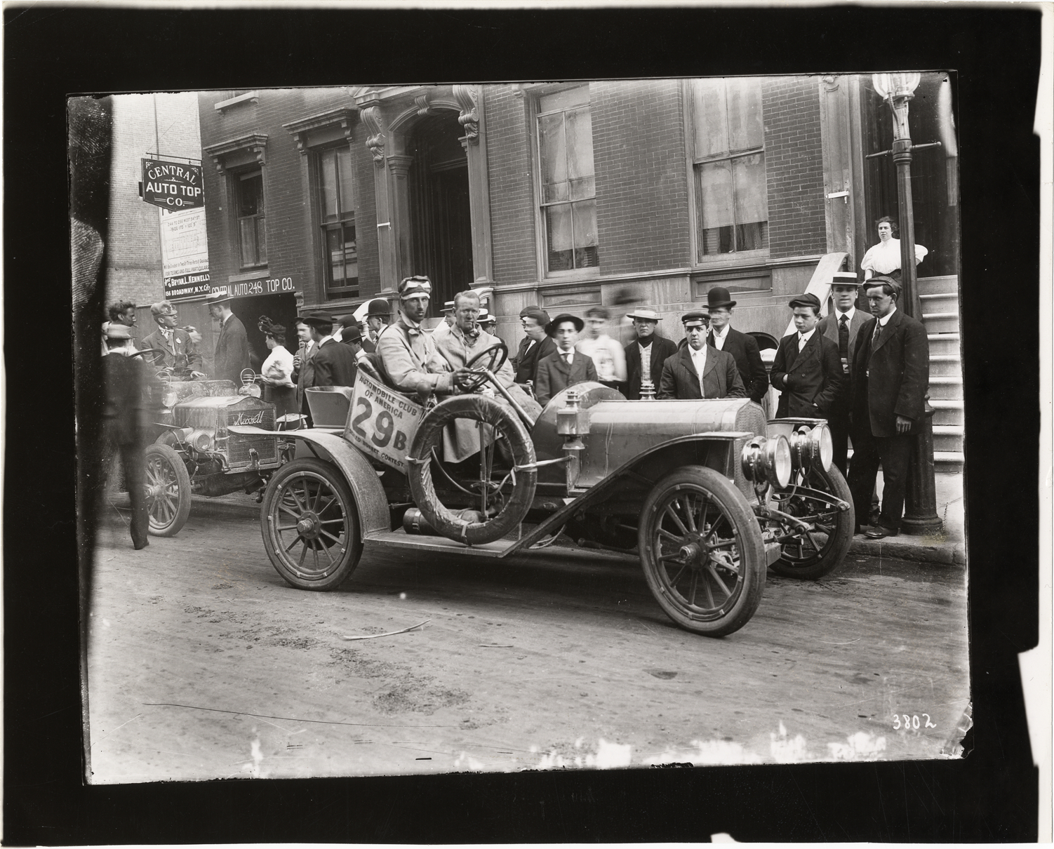 Driver and passenger in automobile, Sealed Bonnet Contest