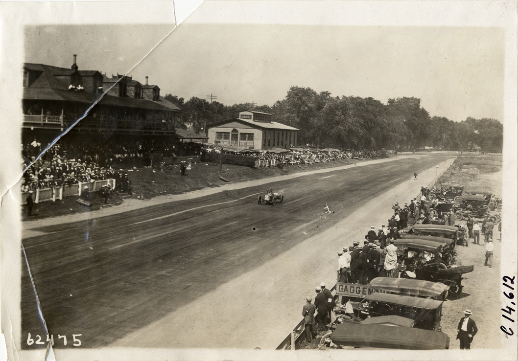 Driver in racecar, 1910 Point Breeze races