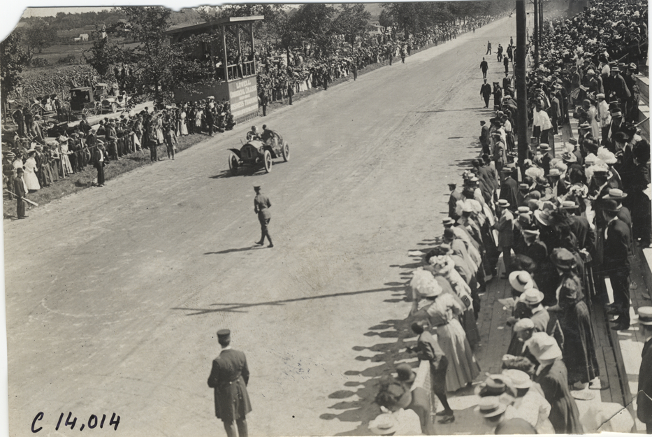 Driver and passenger in racecar, 1908 Lowell road race