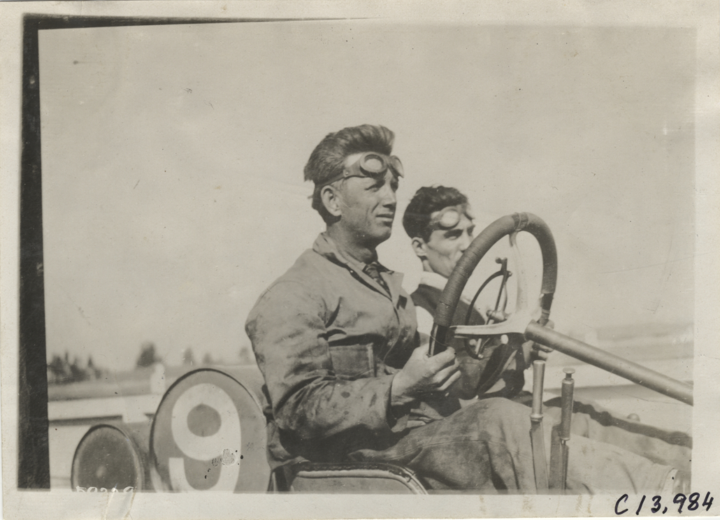Driver and passenger in racecar, 1910 Los Angeles races