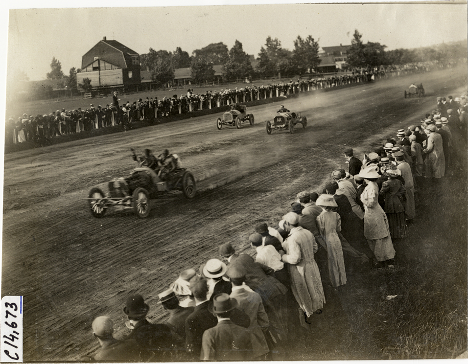 Spectators watching runabout race, 1909 Readville races