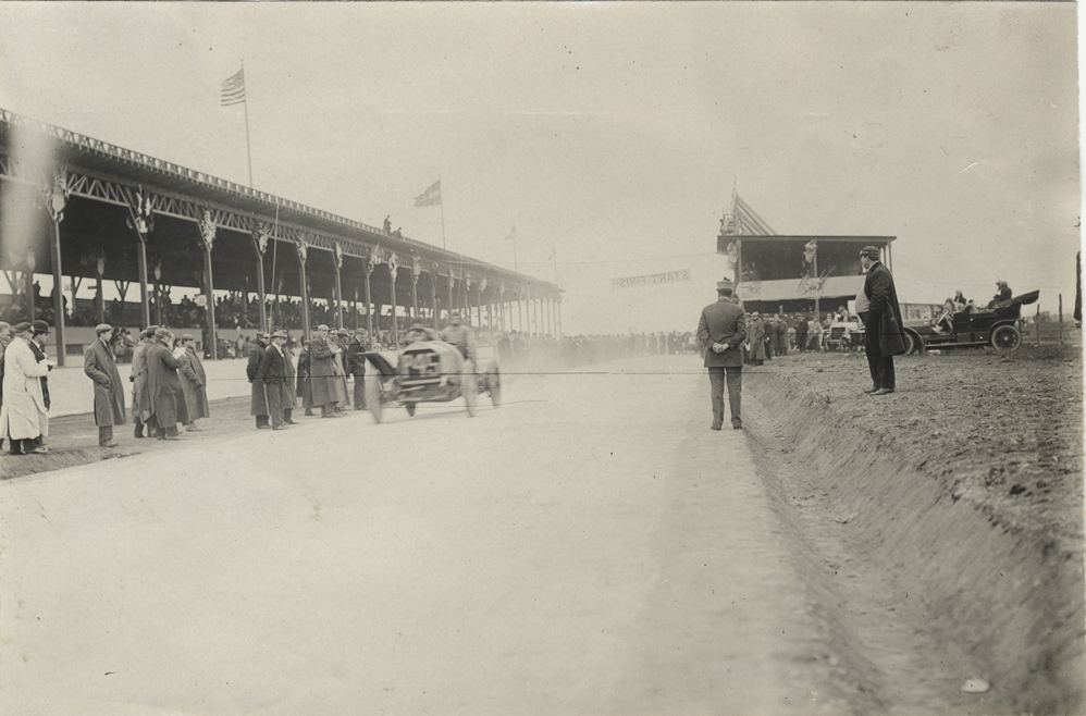 Driver and passenger in racecar, 1908 Long Island Sweepstakes