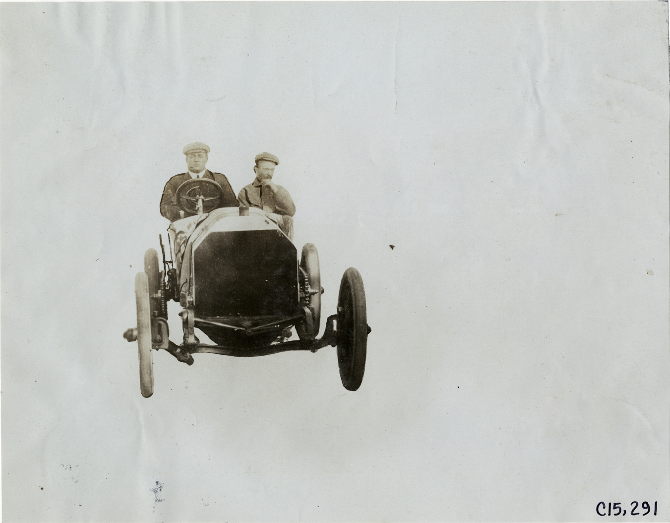 Vincenzo Lancia and passenger in Fiat racecar, 1906 Vanderbilt Cup races