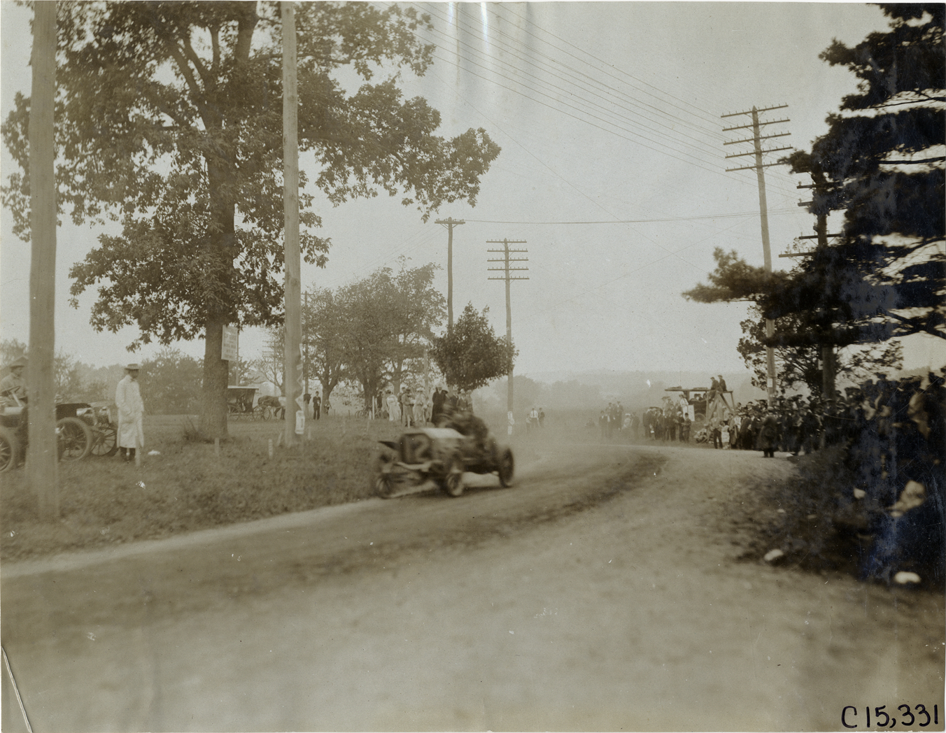Joseph Tracy and passenger in Locomobile racecar, 1906 Vanderbilt Cup races