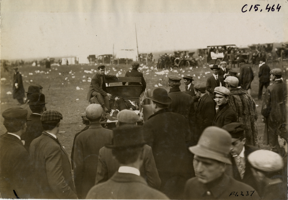 Truck transporting injured man, 1908 Vanderbilt Cup races