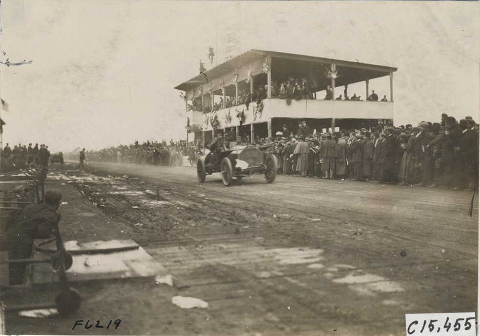 Driver and passenger in racecar, 1908 Vanderbilt Cup races