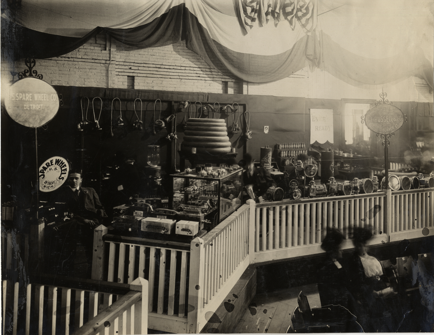 U.S. Spare Wheel Company and T.F. Russell Company exhibits, 1909 Boston Auto Show