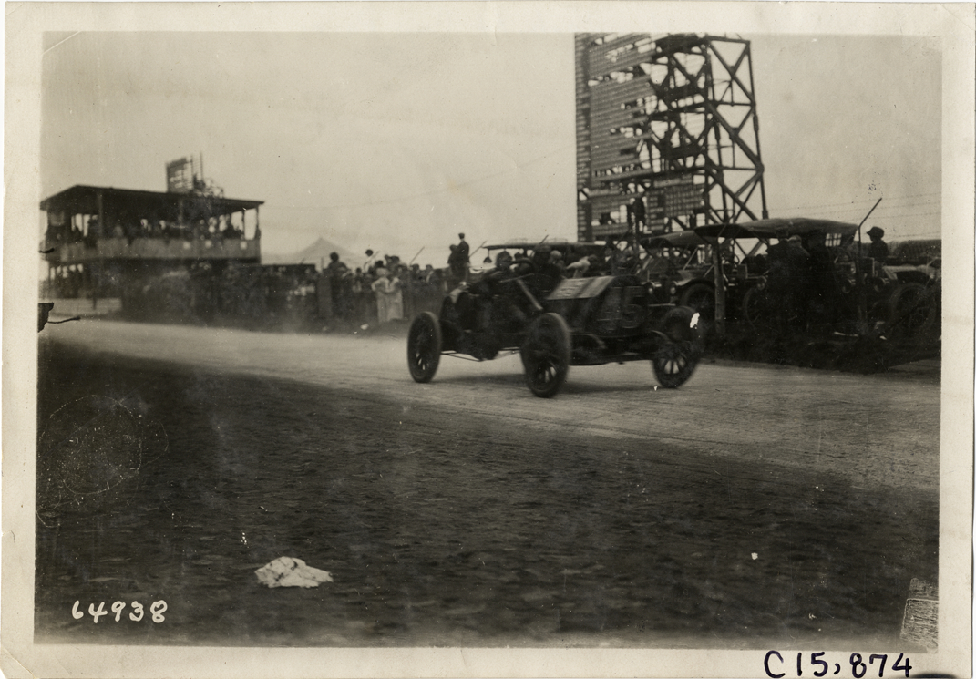 Driver and passenger in racecar, 1910 Vanderbilt Cup races