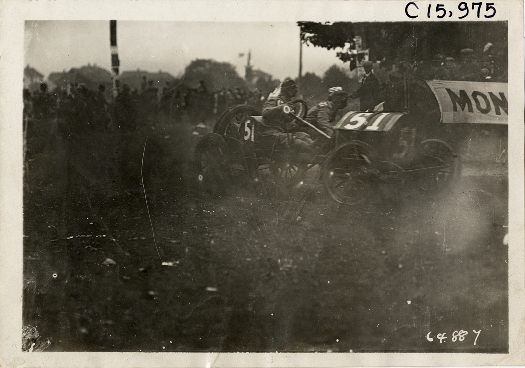 Driver and passenger in racecar, 1910 Vanderbilt Cup races