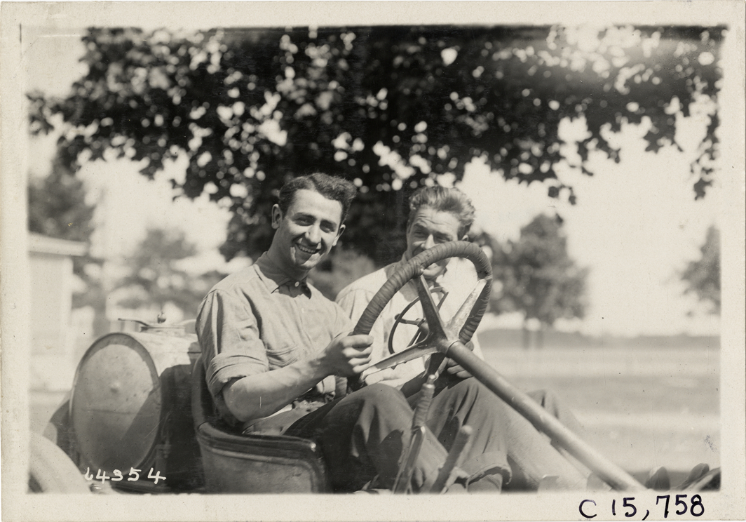 Driver and passenger in racecar, 1910 Vanderbilt Cup races