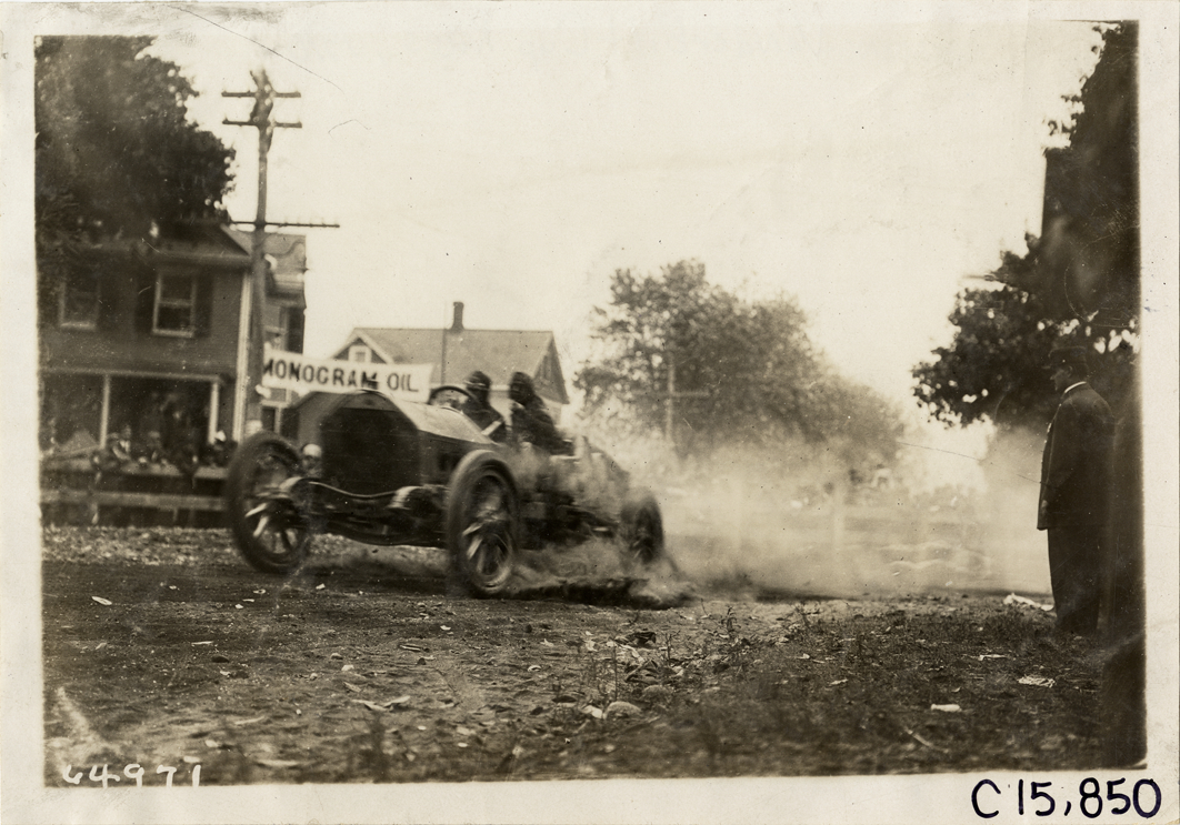 Driver and passenger in racecar, 1910 Vanderbilt Cup races