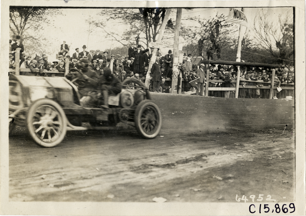 Driver and passenger in racecar, 1910 Vanderbilt Cup races