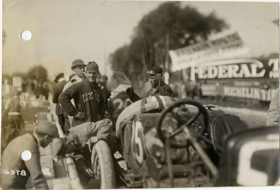 Pit crew working on Lozier racecar, 1912 Vanderbilt Cup races