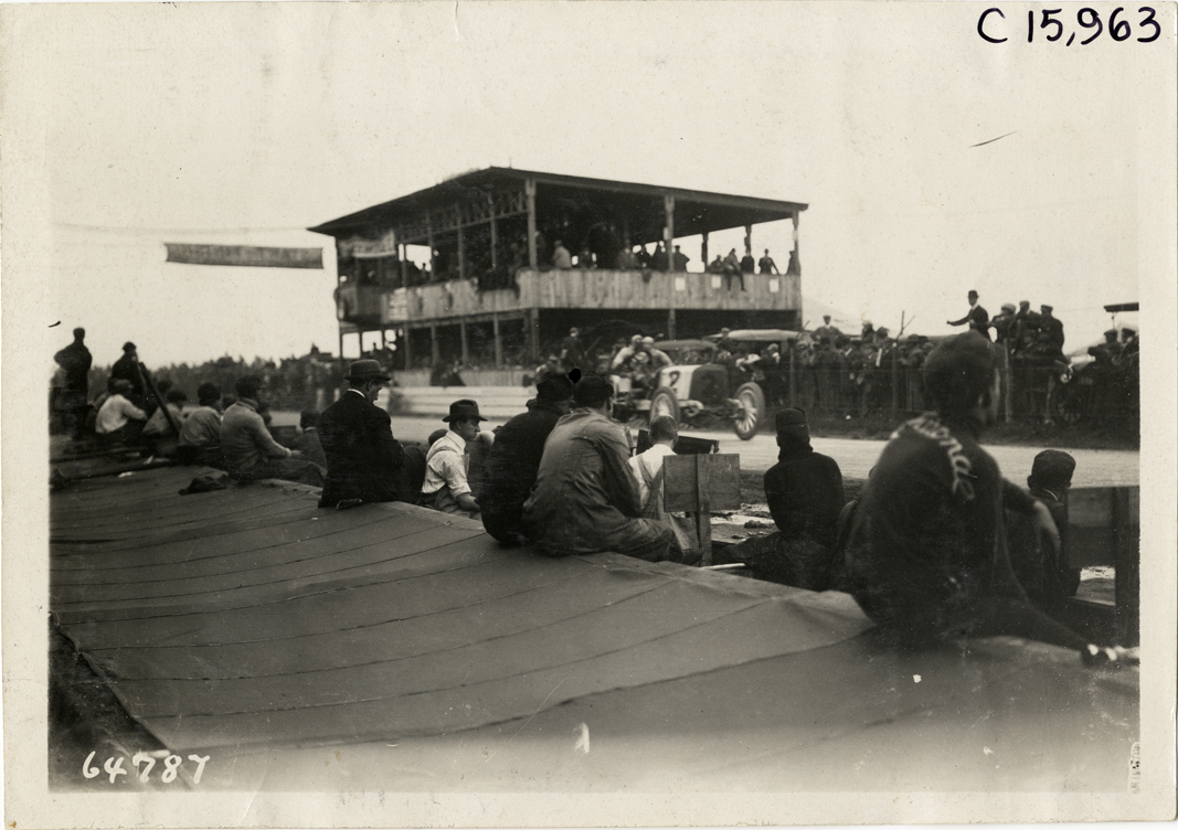 Driver and passenger in racecar, 1910 Vanderbilt Cup races