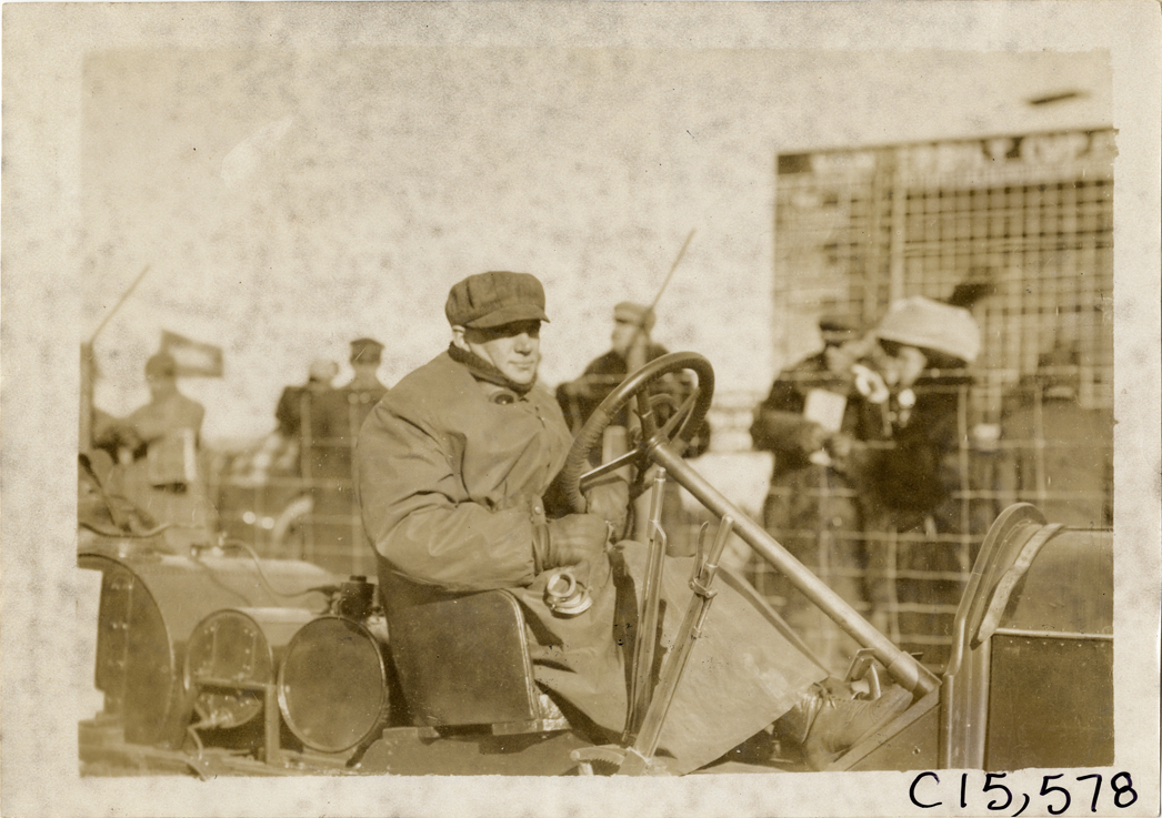 Driver in racecar, 1909 Vanderbilt Cup races