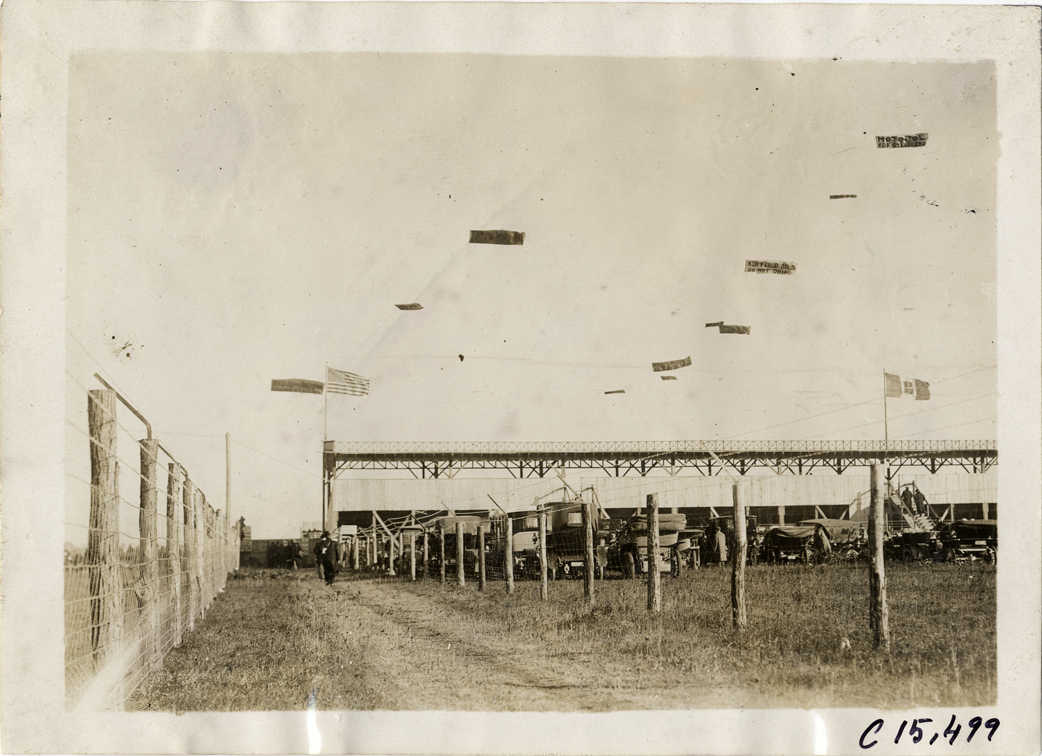 Advertising banners over parking lot, 1909 Vanderbilt Cup races