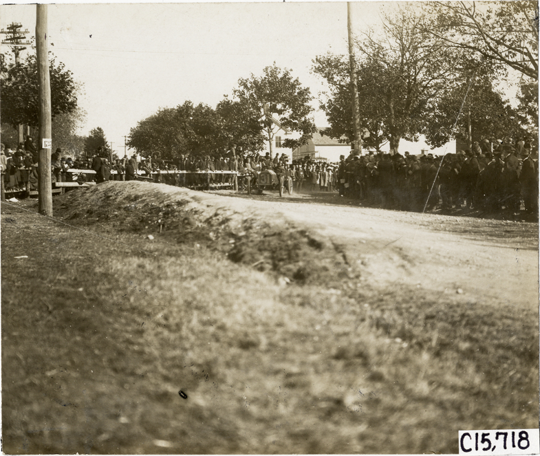 Driver and passenger in racecar, 1909 Vanderbilt Cup races