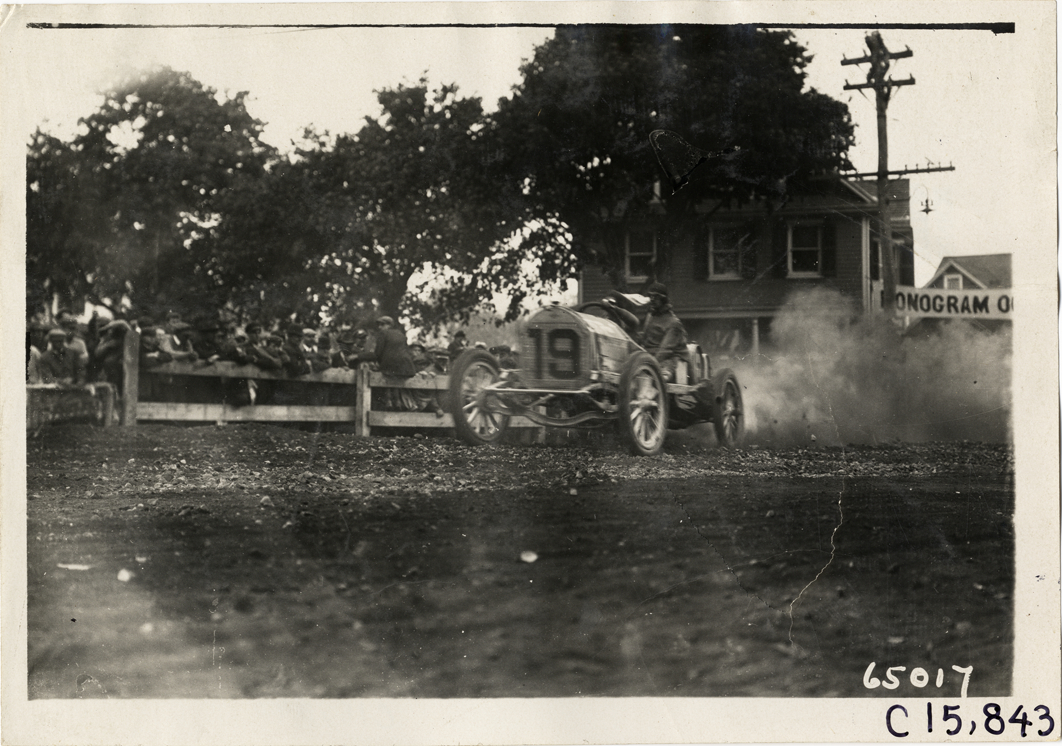 Driver and passenger in racecar, 1910 Vanderbilt Cup races