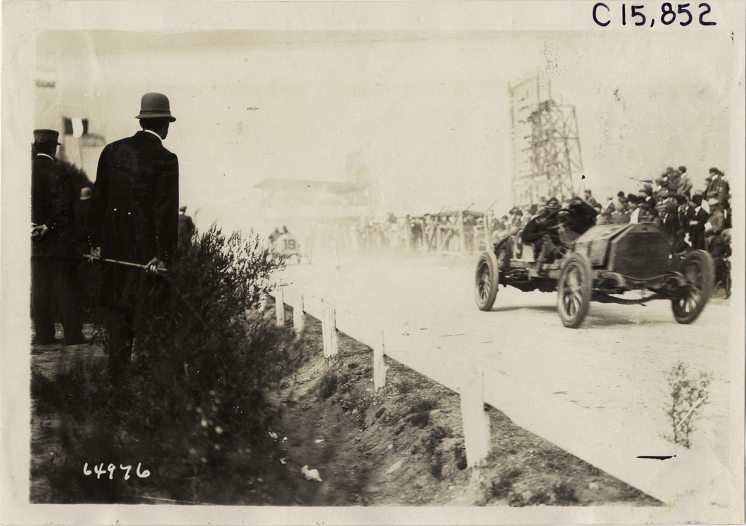 Driver and passenger in racecar, 1910 Vanderbilt Cup races