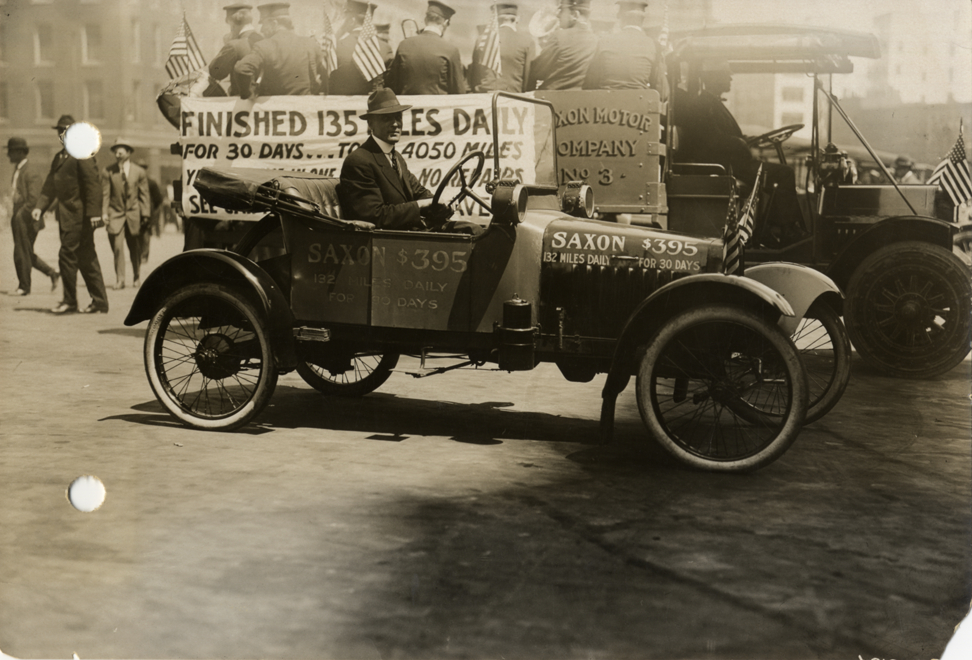 M.A. Croker posing in 1914 Saxon car after endurance run
