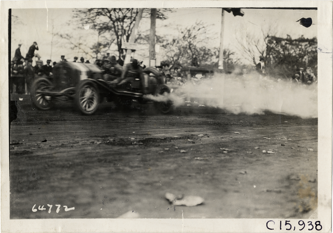 Driver and passenger in racecar, 1910 Vanderbilt Cup races