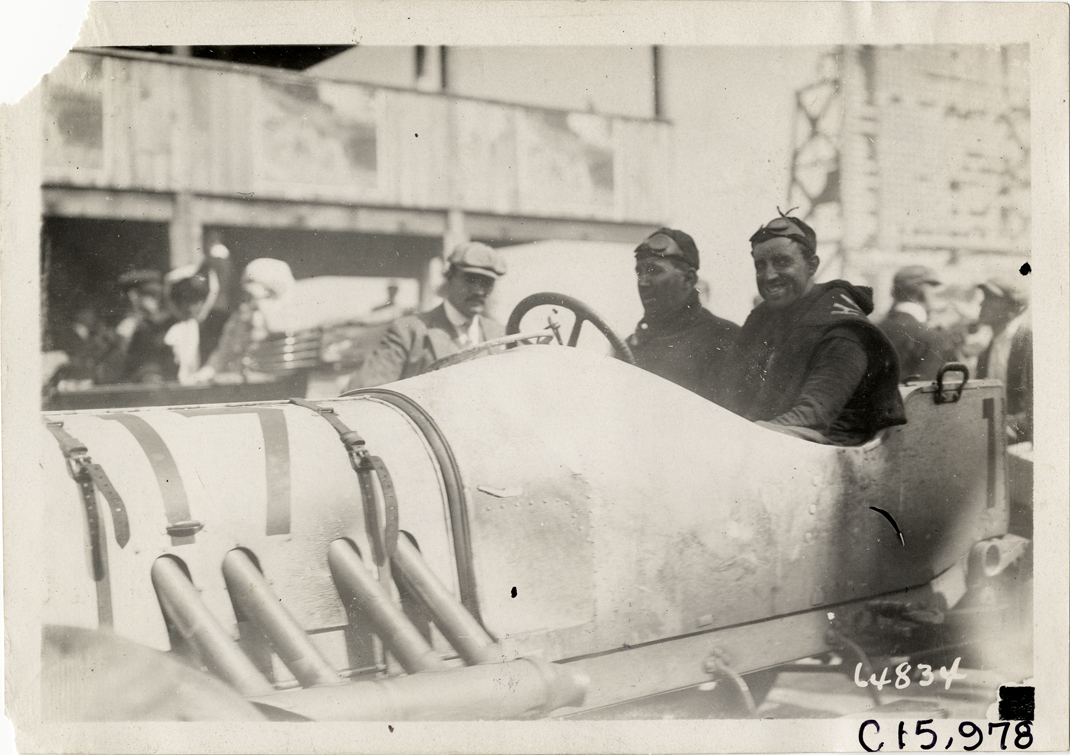 Driver and passenger in racecar, 1910 Vanderbilt Cup races