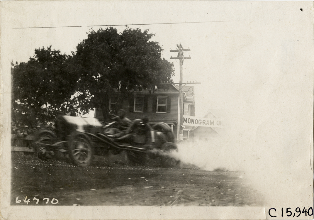Driver and passenger in racecar, 1910 Vanderbilt Cup races