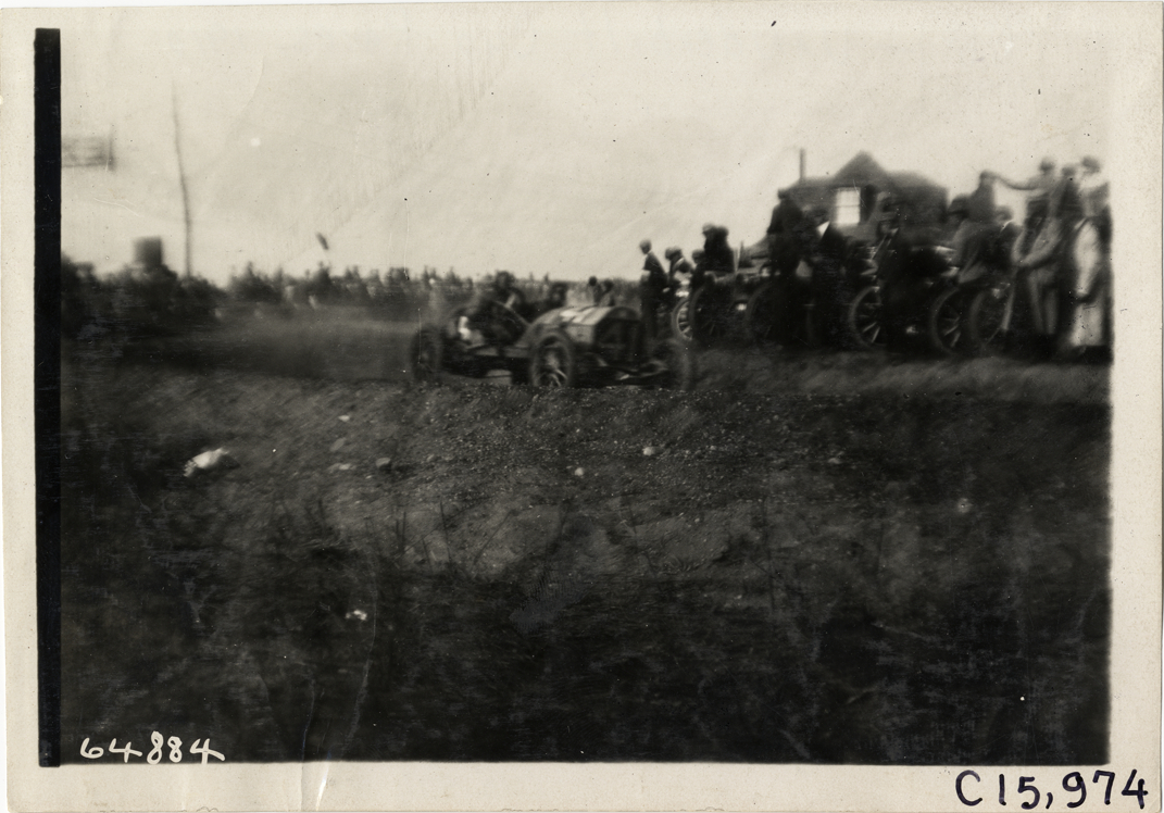 Driver and passenger in racecar, 1910 Vanderbilt Cup races