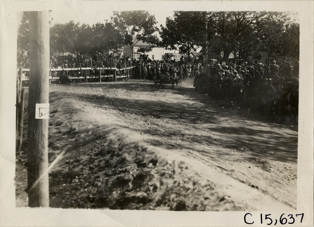 Driver and passenger in racecar, 1909 Vanderbilt Cup races