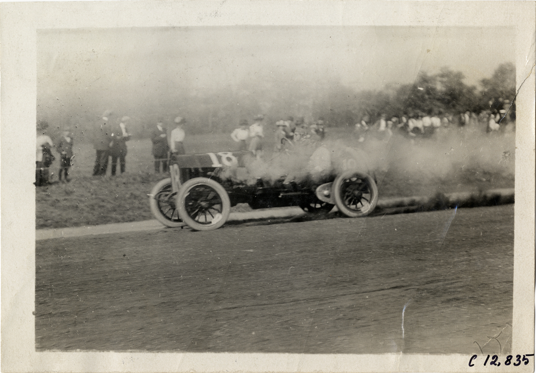 Driver in racecar, 1909 Fairmount Park races