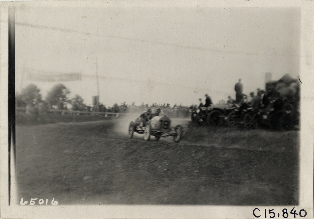 Driver and passenger in racecar, 1910 Vanderbilt Cup races